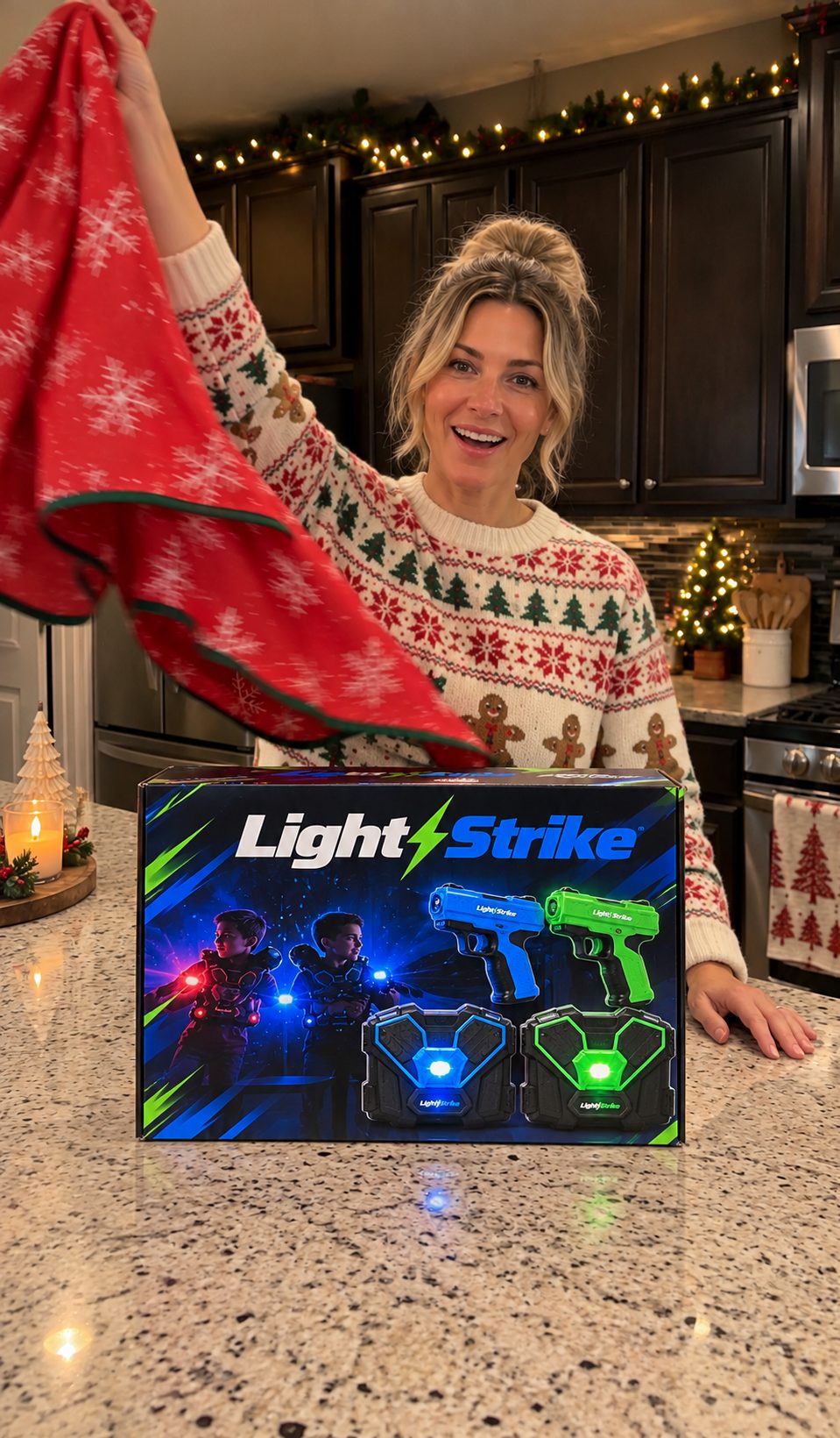 A mum revealing a Light Strike laser tag set on the kitchen bench